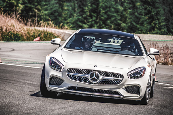 Student driving with instructor at the Vancouver Island Motorsport Circuit